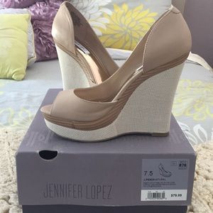 JLo sophisticated wedge peekaboo toe heel
